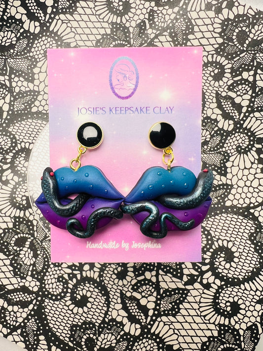 Medusa lip earrings